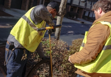 Workers doing commercial plumbing