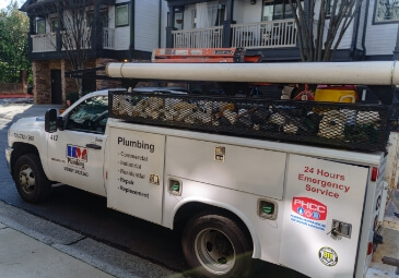 A HM Plumbing service truck