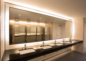 commercial-bathroom-with-row-of-four-sinks