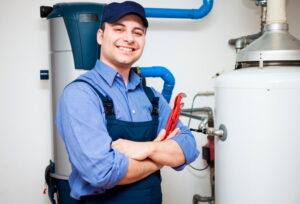 Technician servicing an hot-water heater